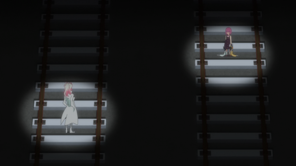 Sanetoshi and Momoka face off on opposing railroad tracks